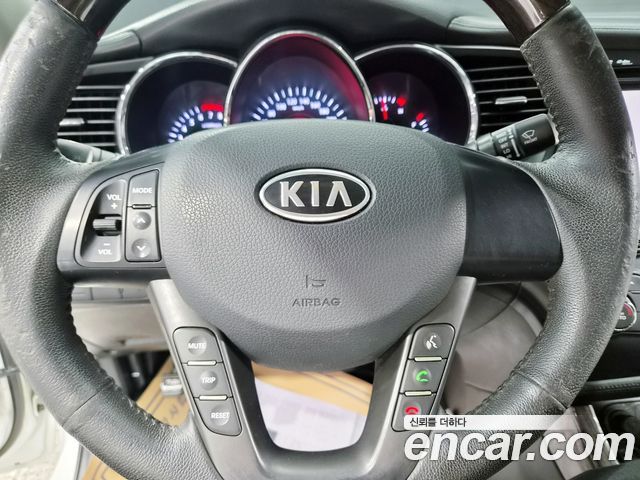 Kia K5 2011 — photo 13