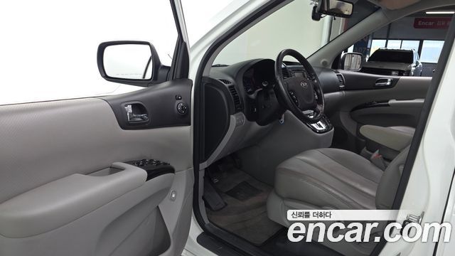 Kia Canival 2014 — photo 13