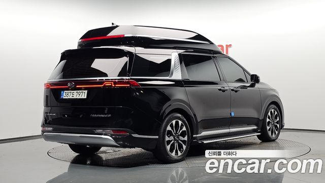 Kia Canival 2021 — photo 2