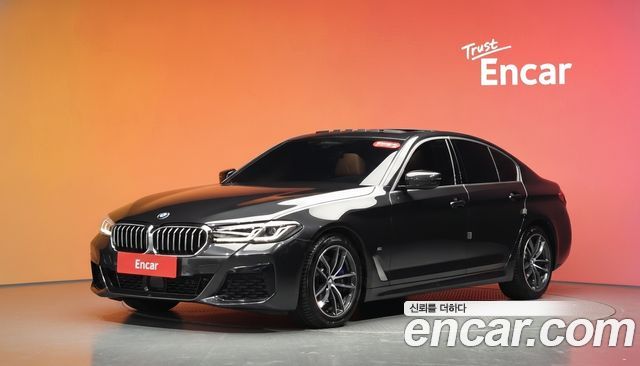 BMW 5-Series 2022 — photo 1