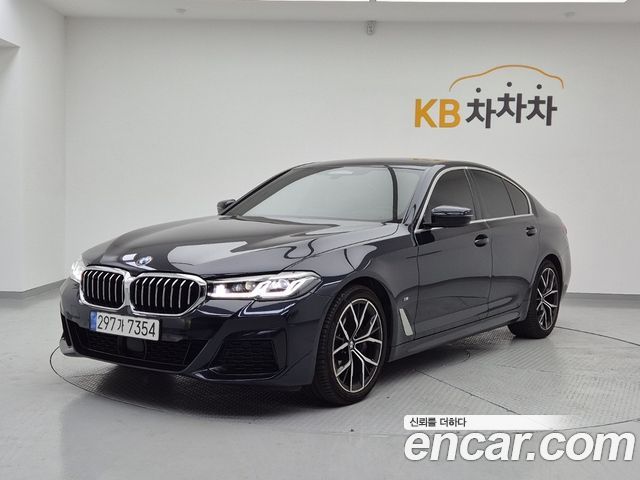 BMW 5-Series 2022 — photo 1
