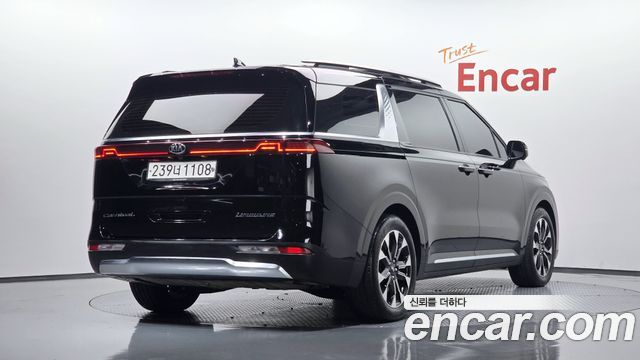 Kia Canival 2021 — photo 2