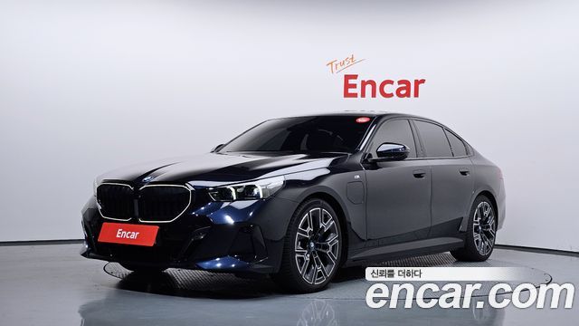 BMW 5-Series 2024 — photo 1