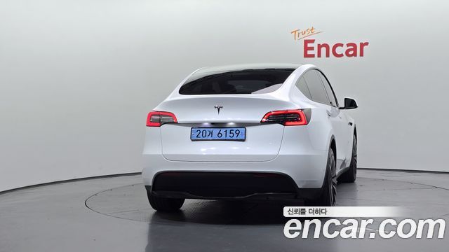 Tesla Model Y 2024 — photo 4