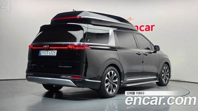 Kia Canival 2021 — photo 2