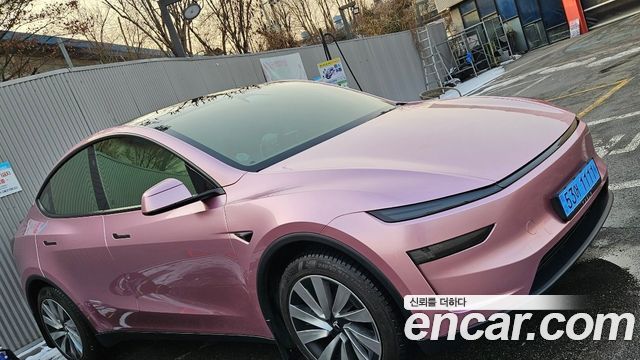 Tesla Model Y 2025 — photo 2