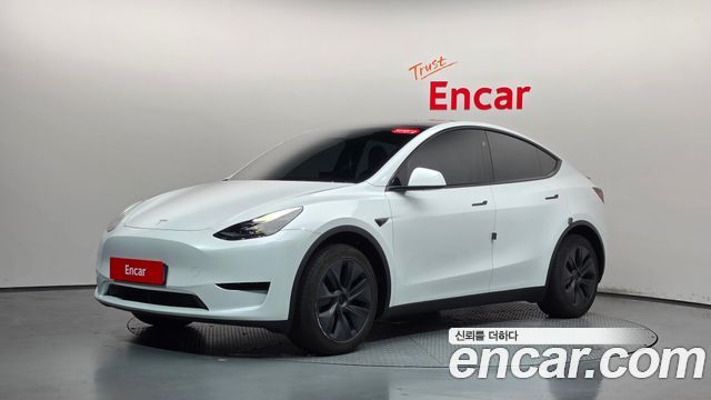 Tesla Model Y 2024 — photo 31