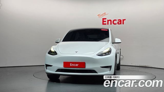 Tesla Model Y 2024 — photo 3
