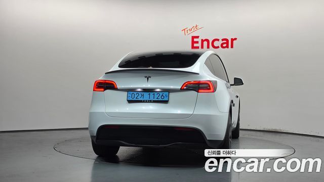 Tesla Model Y 2024 — photo 4