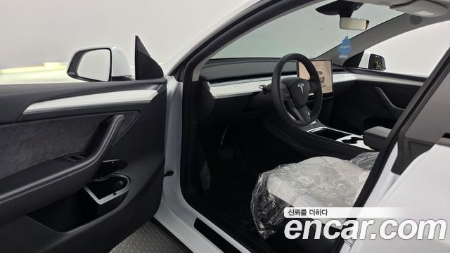 Tesla Model Y 2024 — photo 13