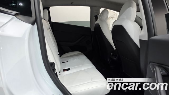 Tesla Model Y 2024 — photo 17