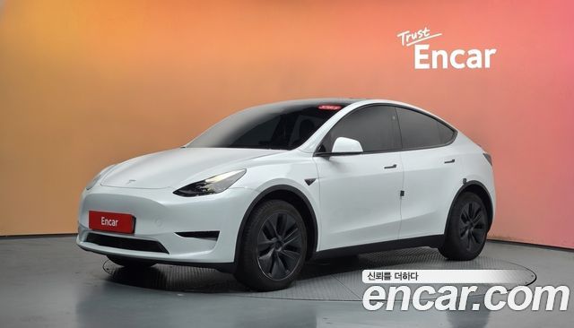 Tesla Model Y 2024 — photo 1
