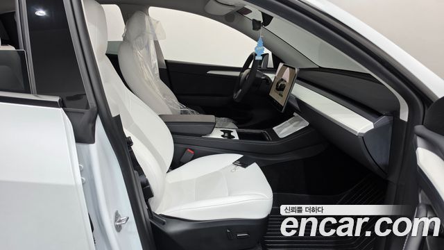 Tesla Model Y 2024 — photo 16