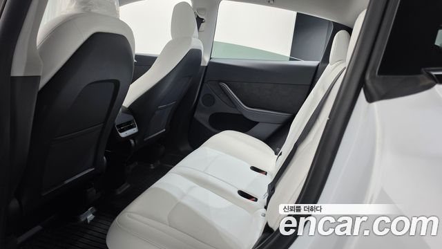 Tesla Model Y 2024 — photo 30