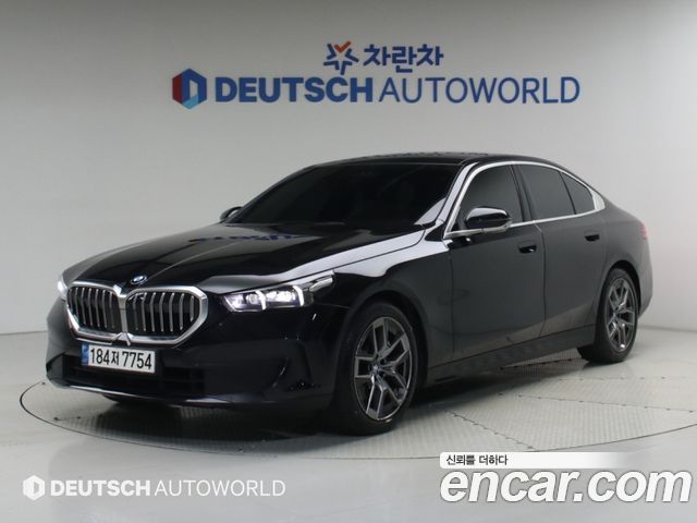 BMW 5-Series 2024 — photo 1