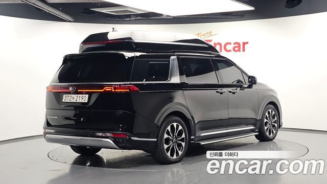 Kia Canival 2021 — photo 2