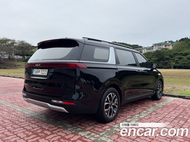 Kia Canival 2022 — photo 2
