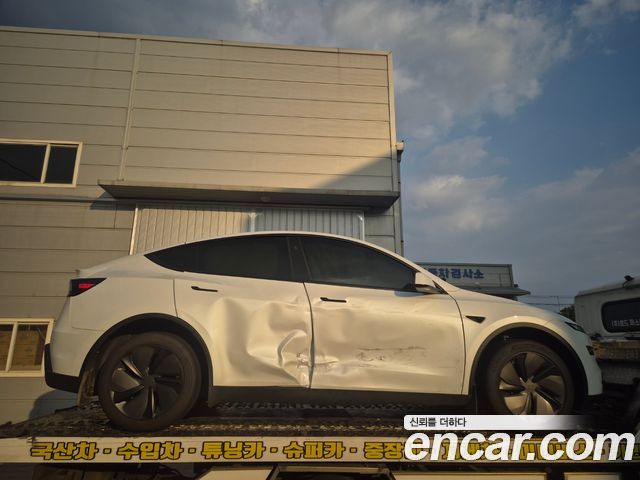 Tesla Model Y 2026 — photo 18