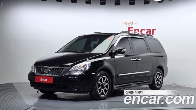 Kia Canival 2012 — photo 1