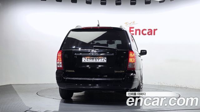 Kia Canival 2012 — photo 4