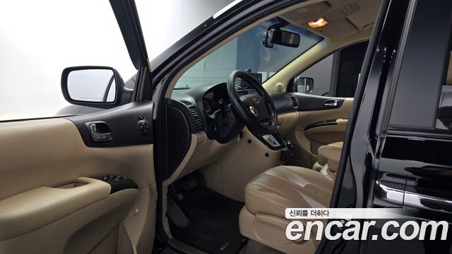 Kia Canival 2012 — photo 13