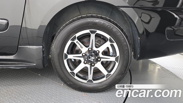 Kia Canival 2012 — photo 7