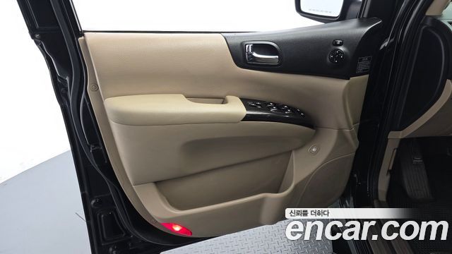 Kia Canival 2012 — photo 14
