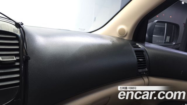 Kia Canival 2012 — photo 28