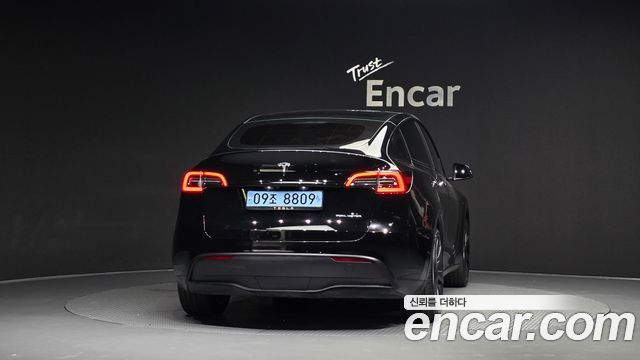 Tesla Model Y 2024 — photo 4