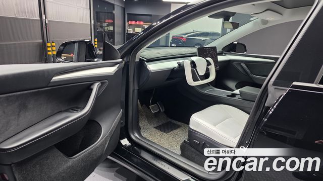Tesla Model Y 2024 — photo 13