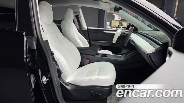 Tesla Model Y 2024 — photo 17