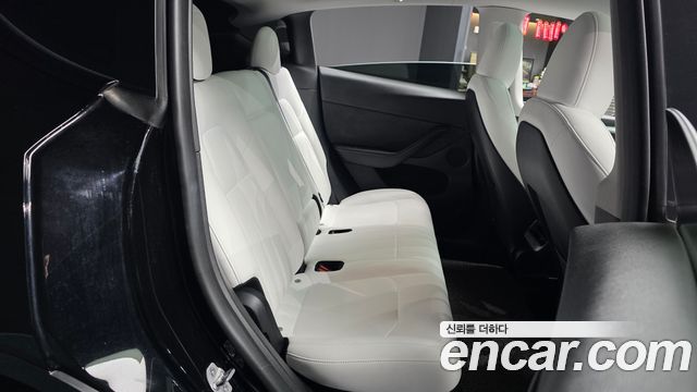 Tesla Model Y 2024 — photo 18