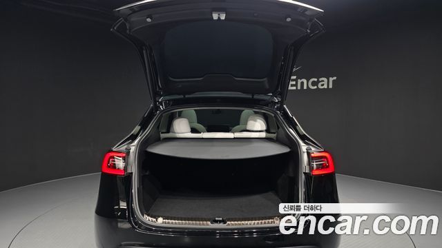 Tesla Model Y 2024 — photo 26