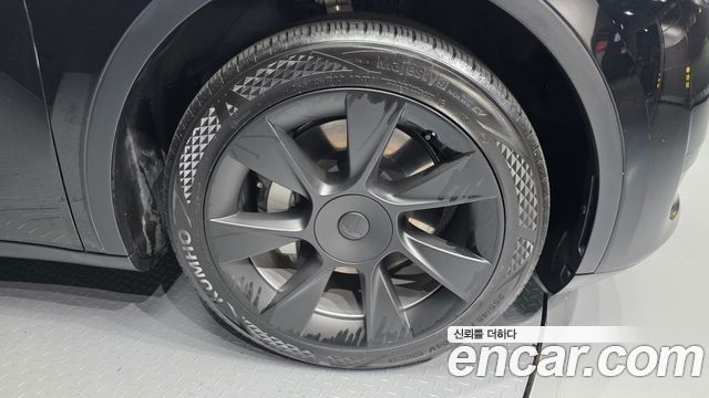 Tesla Model Y 2024 — photo 7