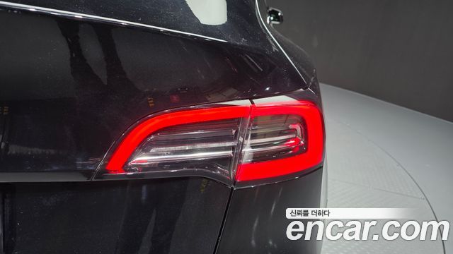 Tesla Model Y 2024 — photo 9
