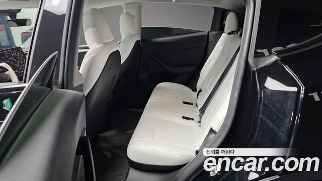 Tesla Model Y 2024 — photo 16