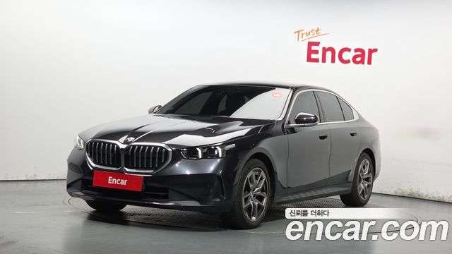 BMW 5-Series 2024 — photo 1