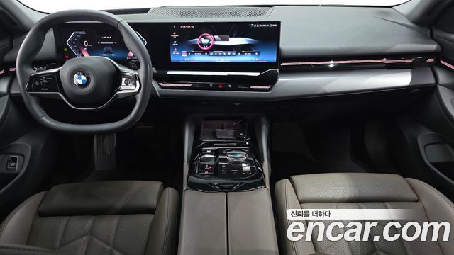 BMW 5-Series 2024 — photo 10