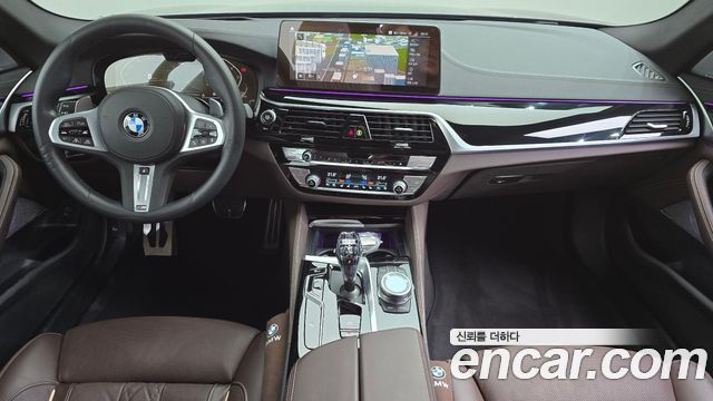 BMW 5-Series 2023 — photo 10