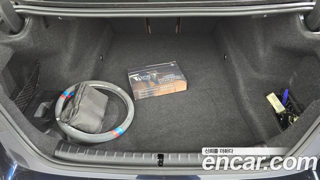 BMW 5-Series 2023 — photo 22