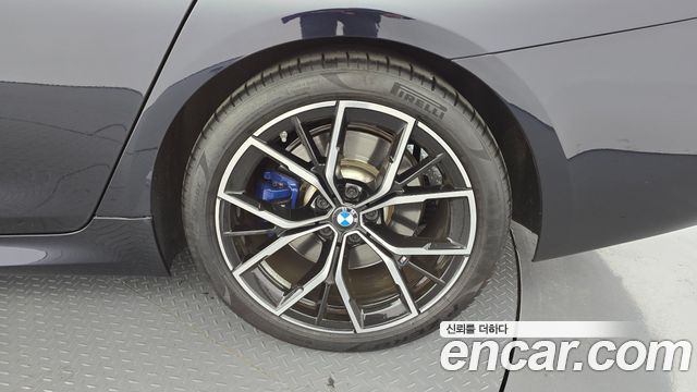 BMW 5-Series 2023 — photo 7