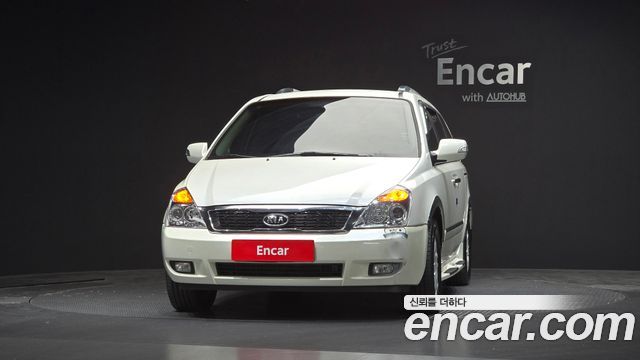 Kia Canival 2010 — photo 3