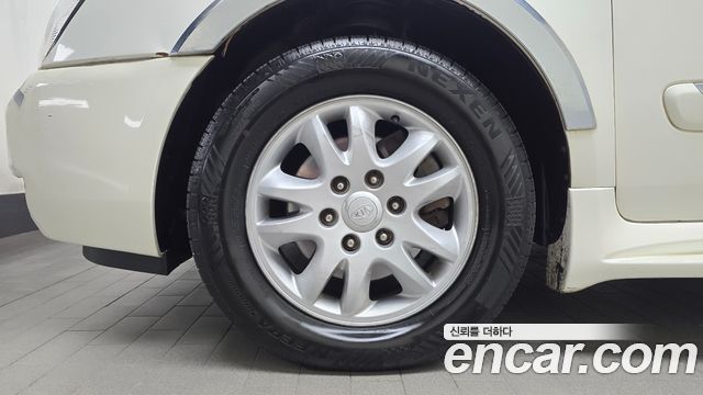 Kia Canival 2010 — photo 5