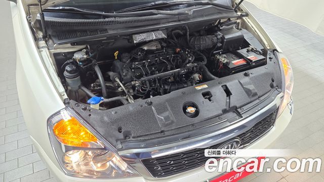 Kia Canival 2010 — photo 6