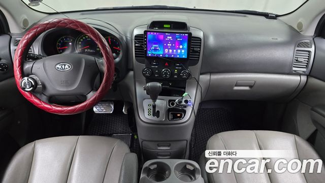 Kia Canival 2010 — photo 10