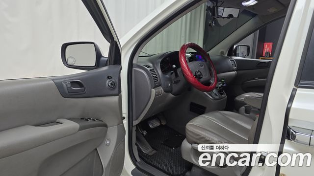 Kia Canival 2010 — photo 13