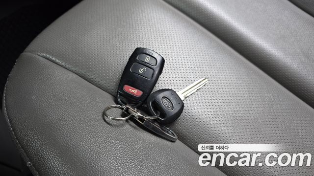 Kia Canival 2010 — photo 23