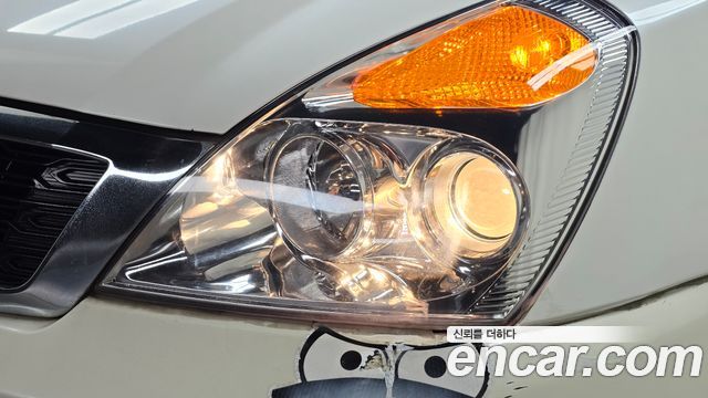 Kia Canival 2010 — photo 8
