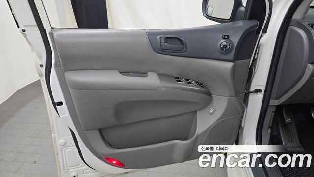 Kia Canival 2010 — photo 14