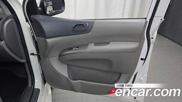 Kia Canival 2010 — photo 15